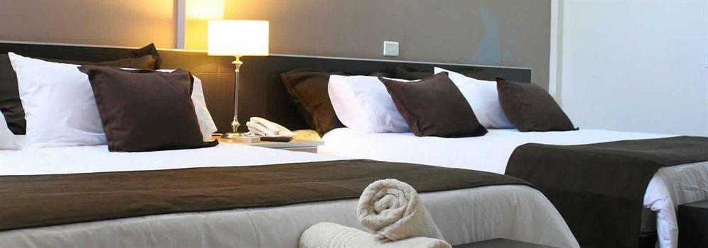 Akwati Suites Iguazu ปูแอร์โตอีกวาซู ภายนอก รูปภาพ